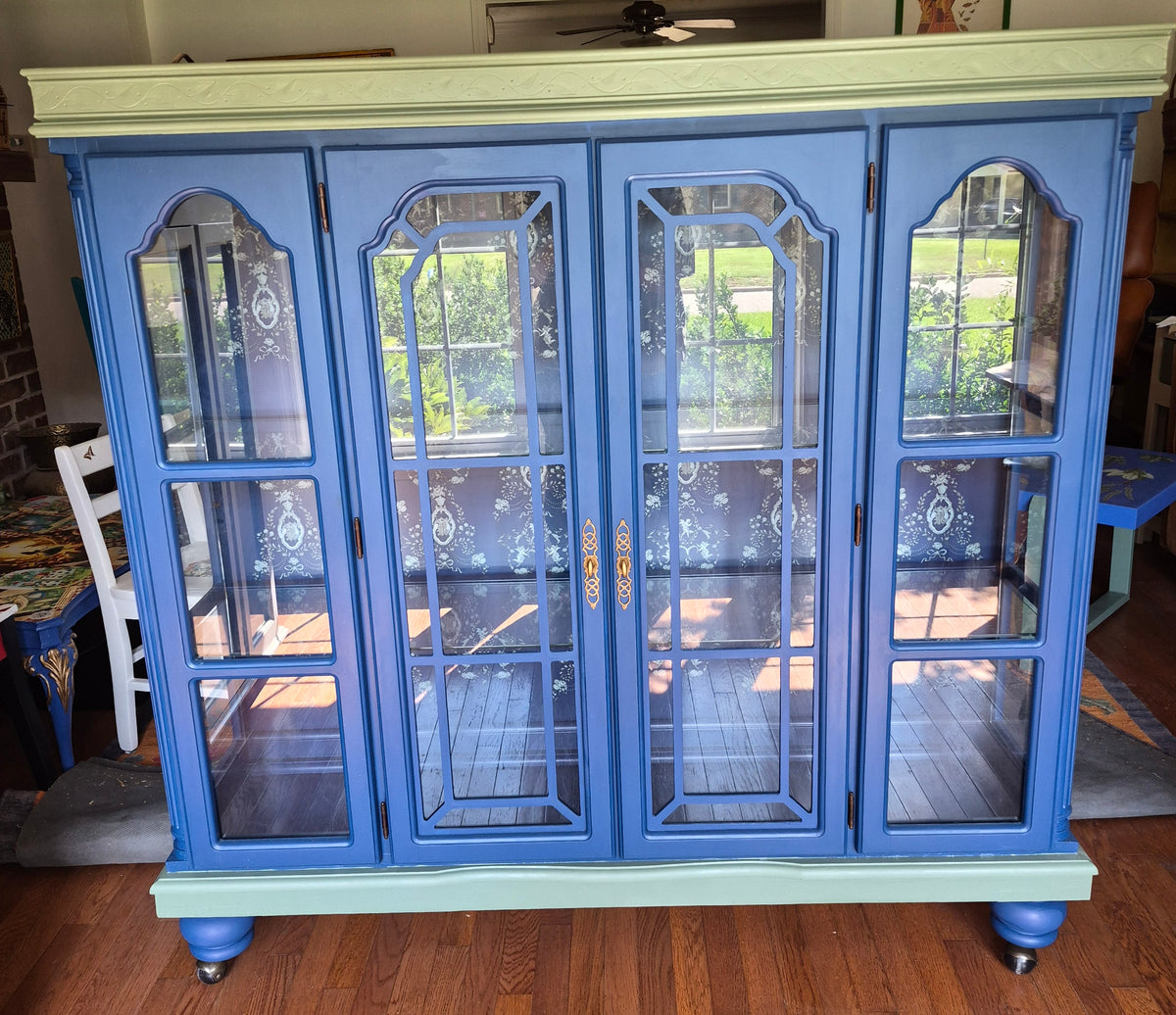 Curio Cabinet on Wheels